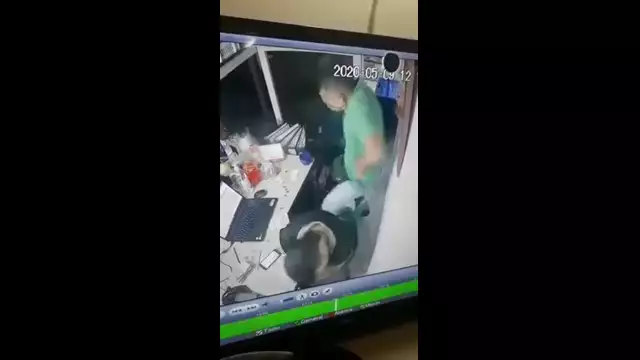 mongoloid plays with gun.Shoots itself in the finger.Nearly blows its friends head off